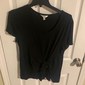 Black dressy top that has a bow in the front